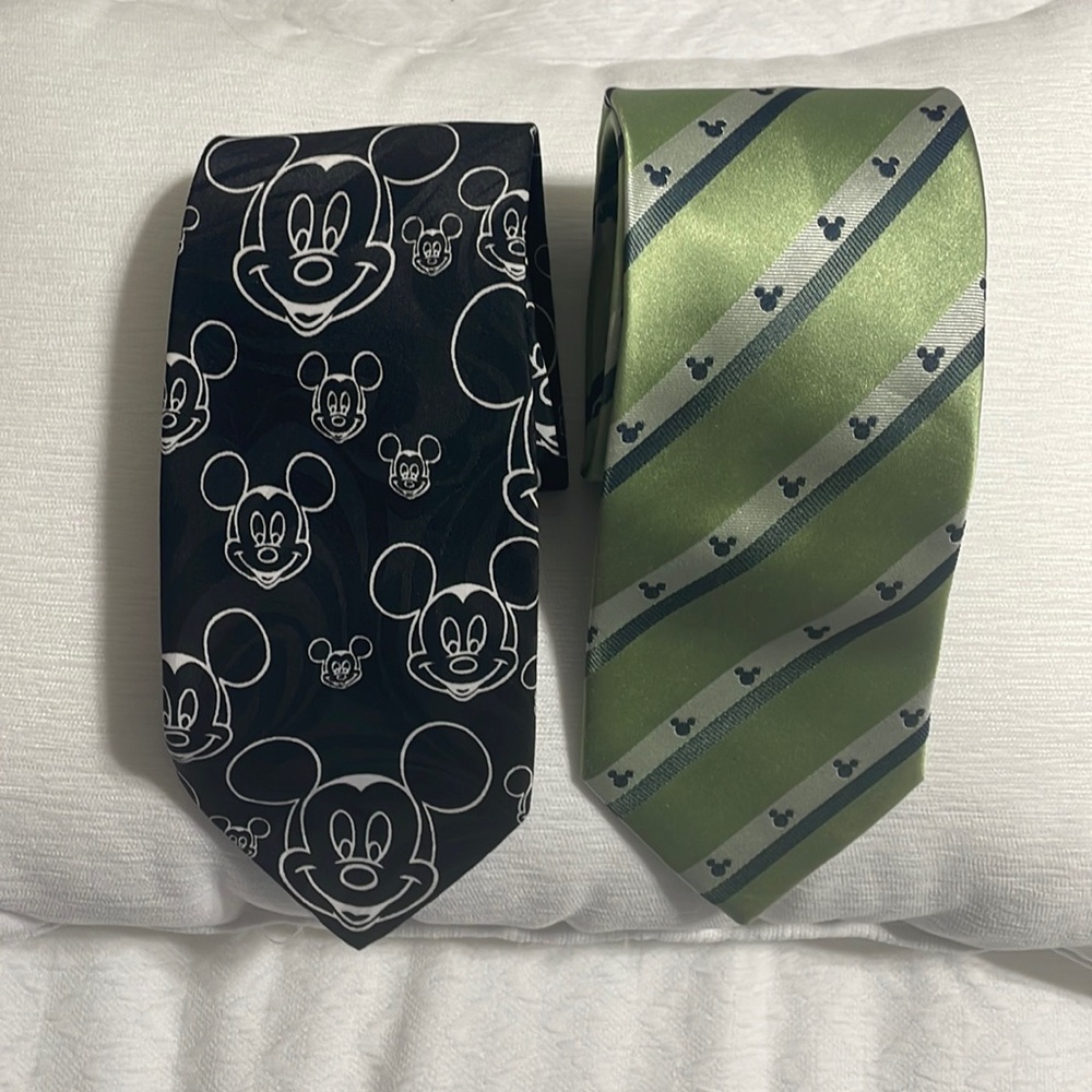 2 Men’s Ties Mickey Mouse Ties. 1 is silk the other is Polyester